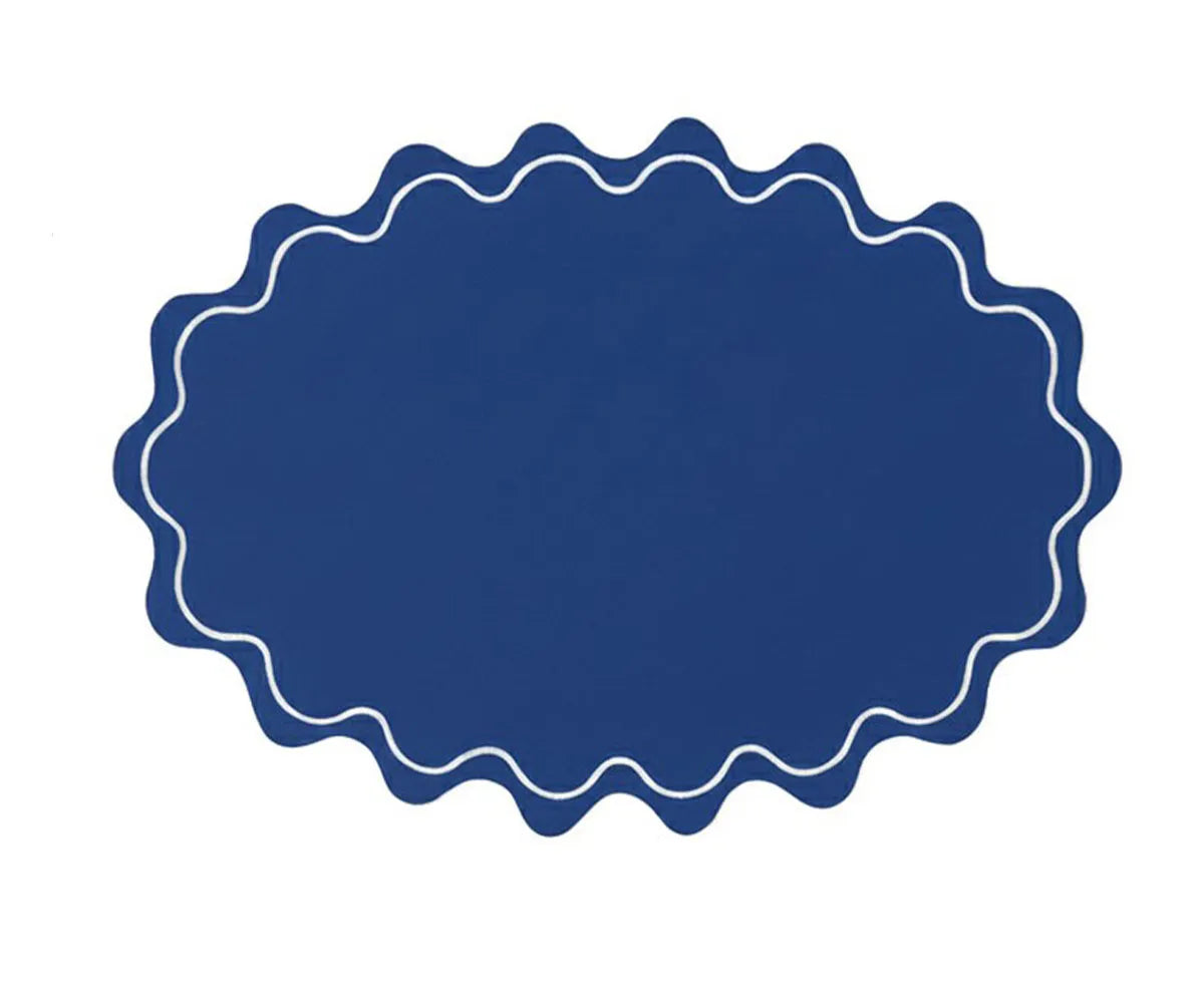 Premium cotton oval placemat featuring a soft wavy silhouette and classic scalloped border for timeless décor Premium cotton oval placemat featuring a soft wavy silhouette and classic scalloped border for timeless décor