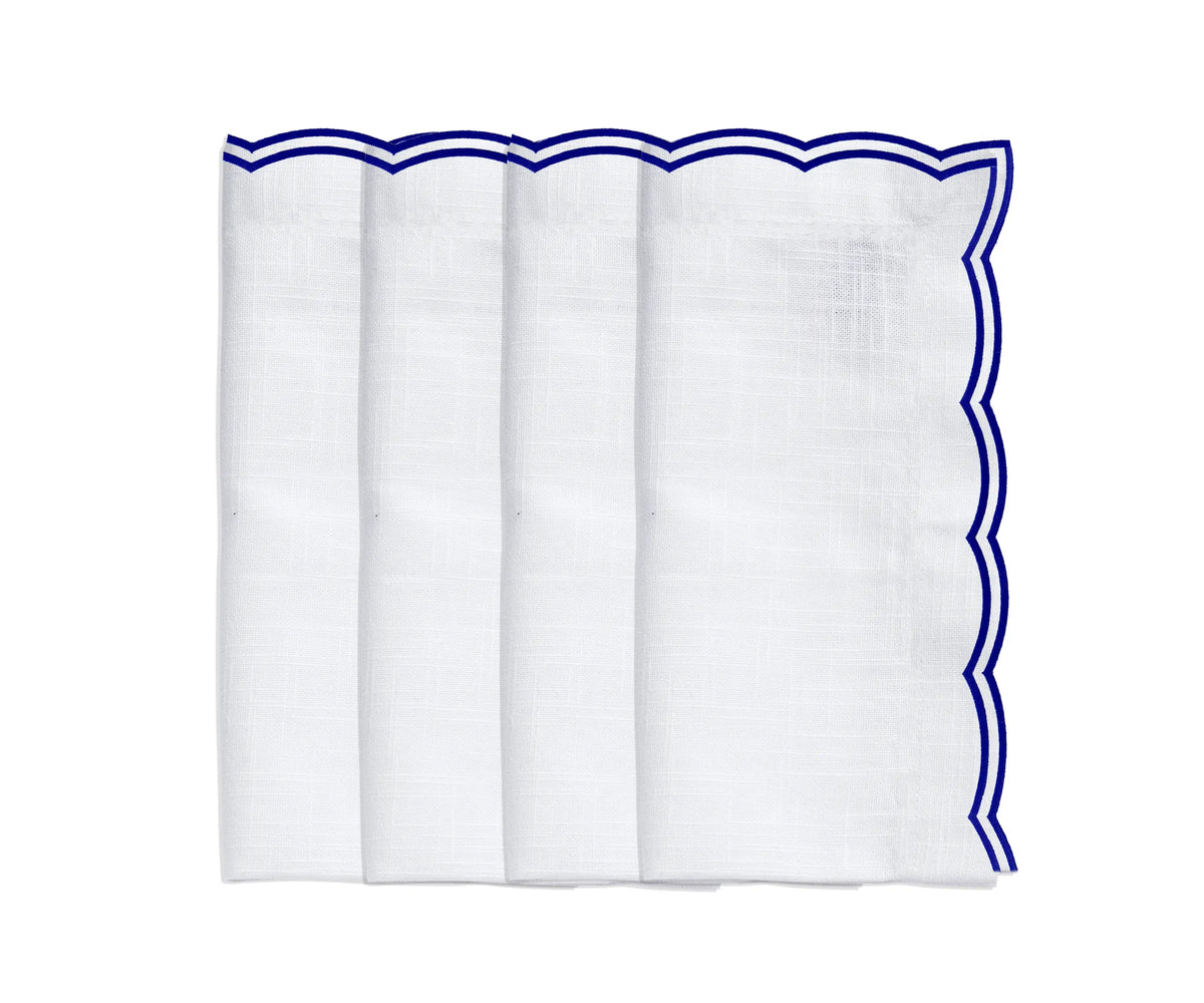 Royal blue scalloped cotton napkins paired with matching placemats Royal blue scalloped cotton napkins paired with matching placemats