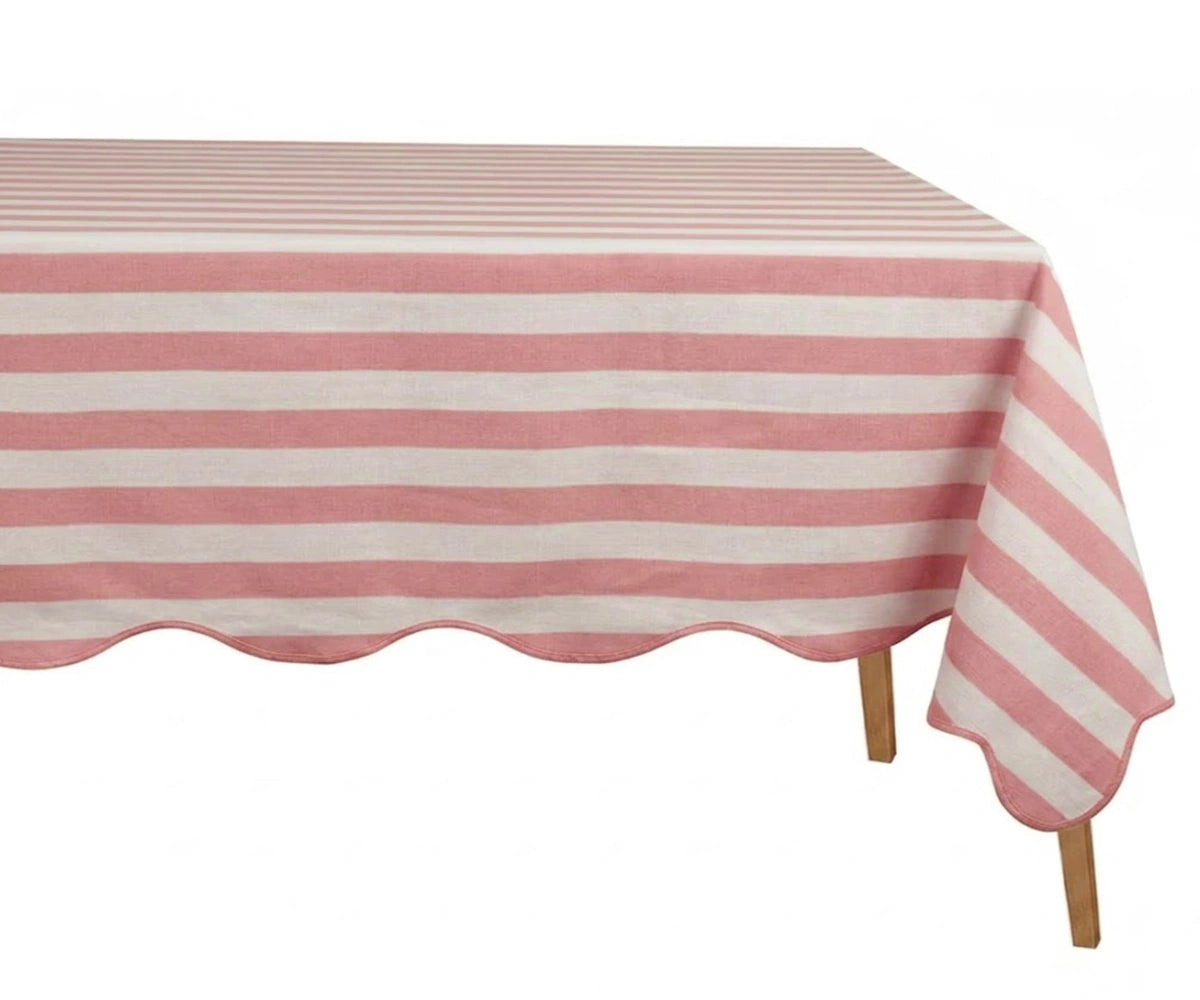 Pink and white striped tablecloth on rectangular table Pink and white striped tablecloth on rectangular table