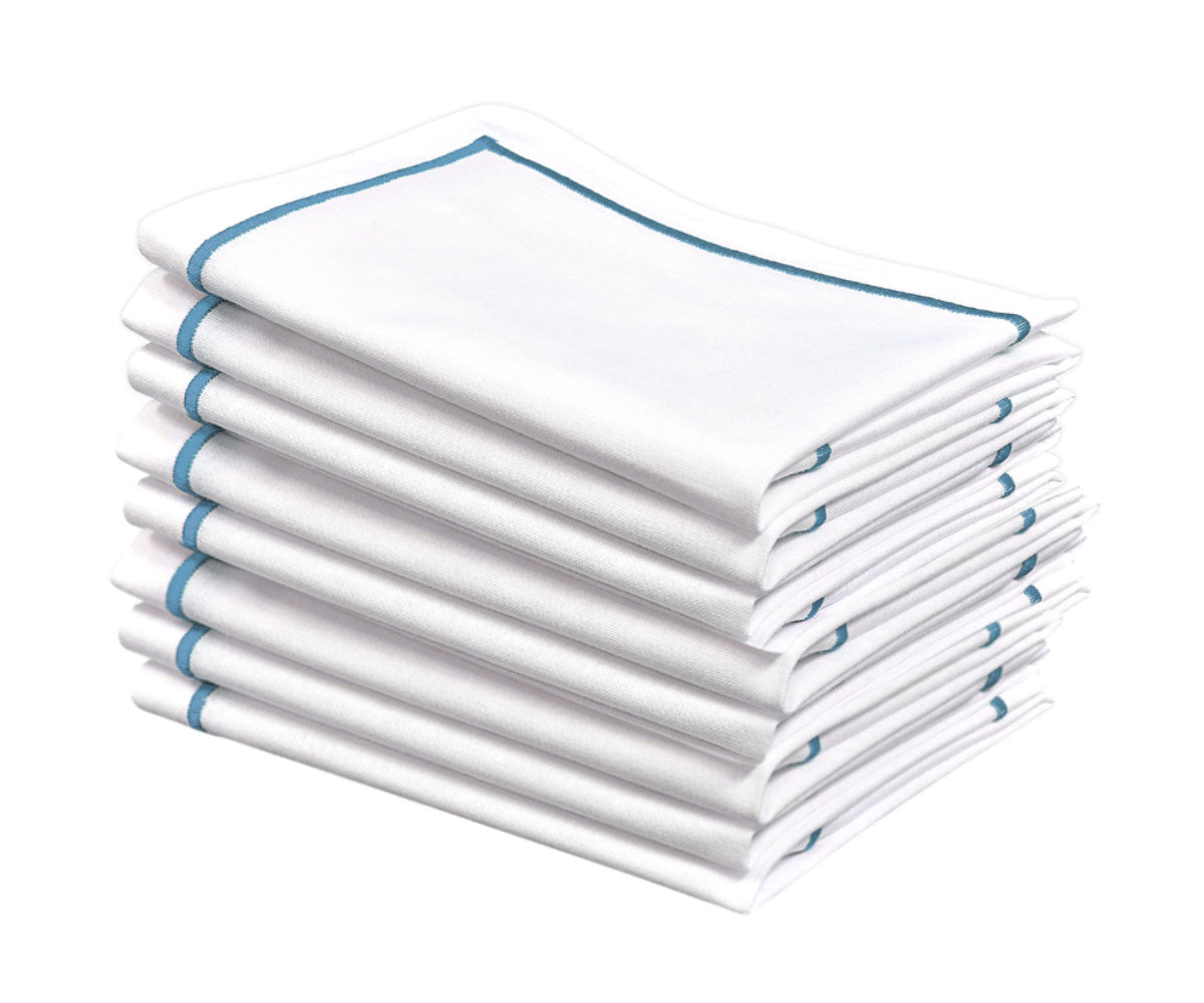 Set your table with soft baby blue napkins, adding a natural touch.