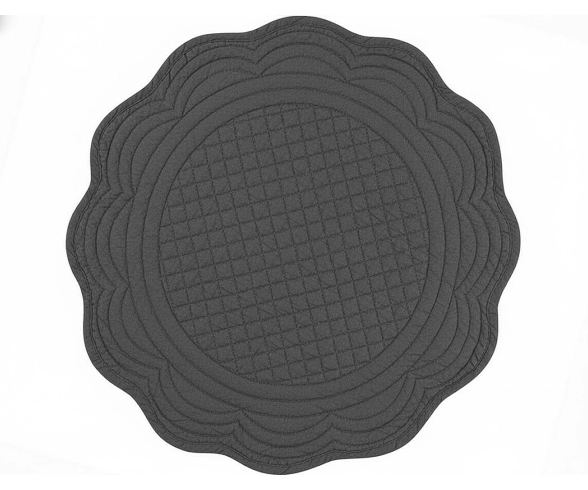 Charcoal quilted cotton round placemat with scalloped edge for contemporary and modern dining tables Charcoal quilted cotton round placemat with scalloped edge for contemporary and modern dining tables