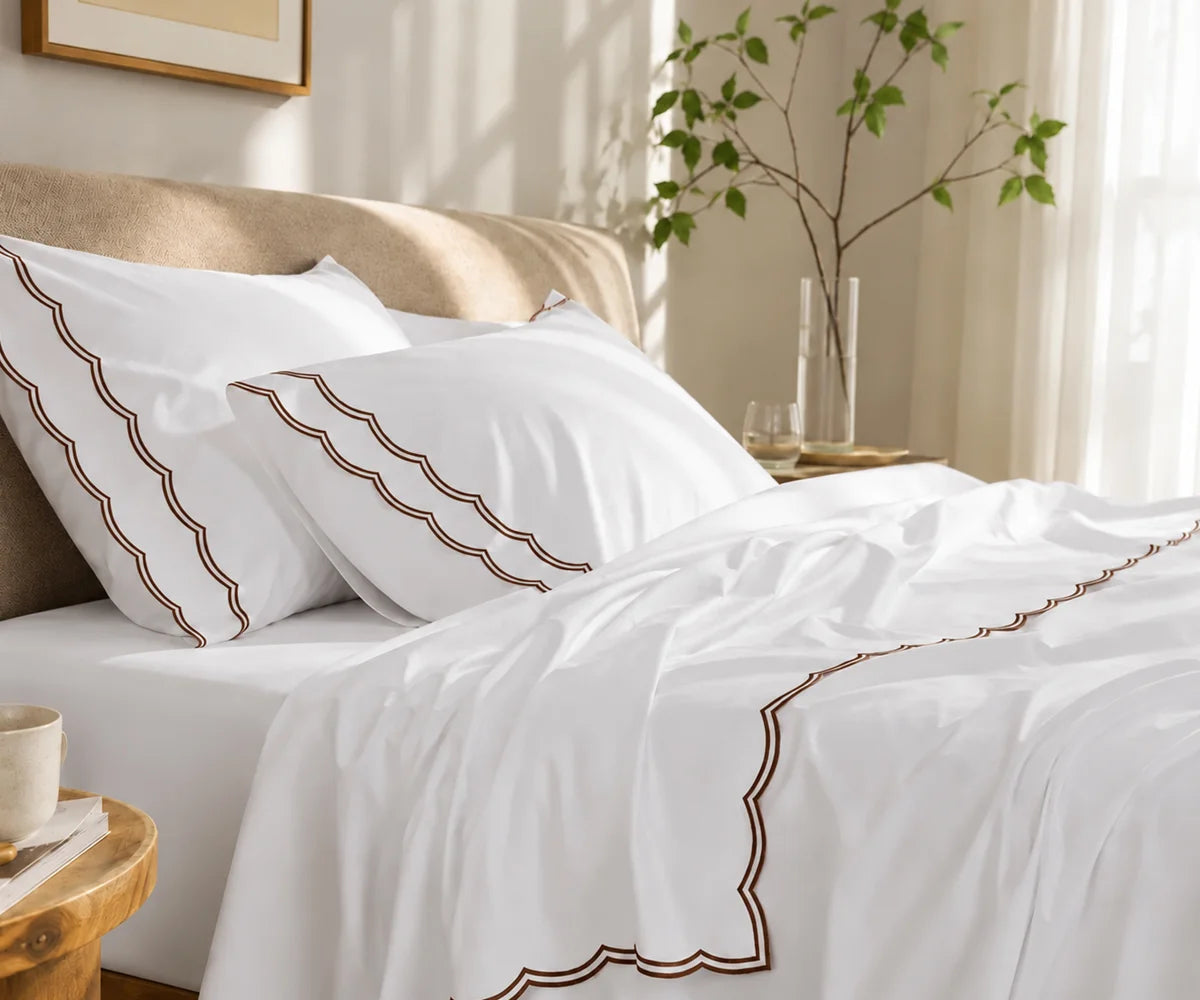 White cotton bedding set with chocolate brown scalloped edge embroidery on pillowcases and flat sheet White cotton bedding set with chocolate brown scalloped edge embroidery on pillowcases and flat sheet