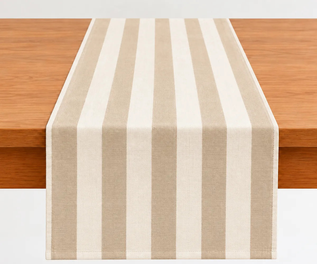 Washable cotton table runner with classic stripes for creating an inviting dining table setting throughout the year Washable cotton table runner with classic stripes for creating an inviting dining table setting throughout the year