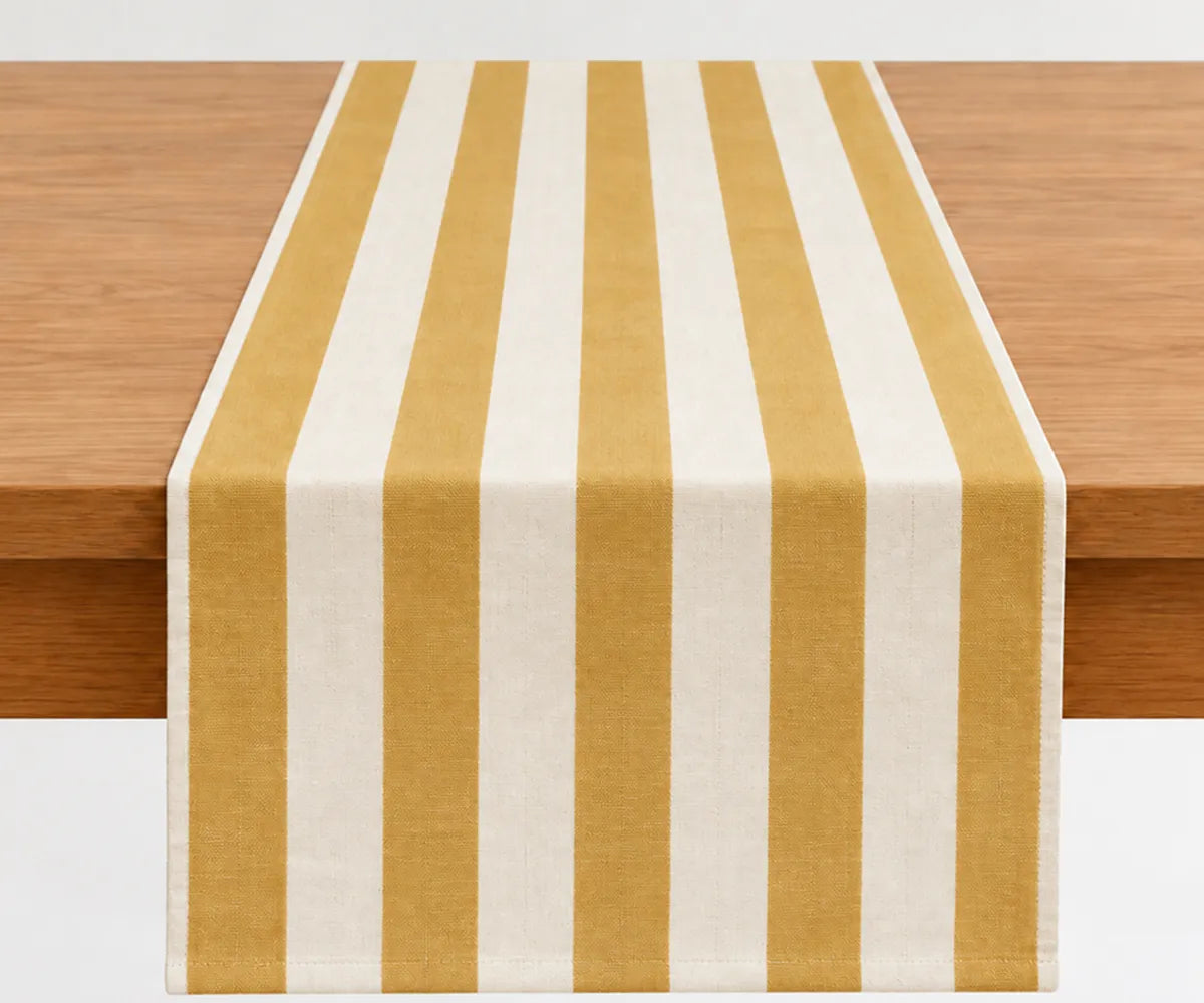 Classic cotton table runner with a cabana stripe design for coordinating dining tables with napkins and complementary linens Classic cotton table runner with a cabana stripe design for coordinating dining tables with napkins and complementary linens