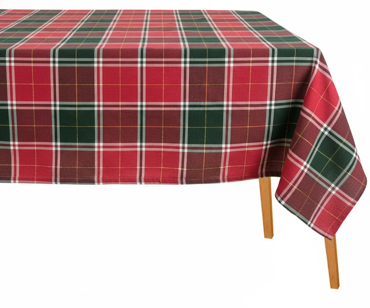 Festive red and green checkered cotton tablecloth fabric with tartan design. Festive red and green checkered cotton tablecloth fabric with tartan design.
