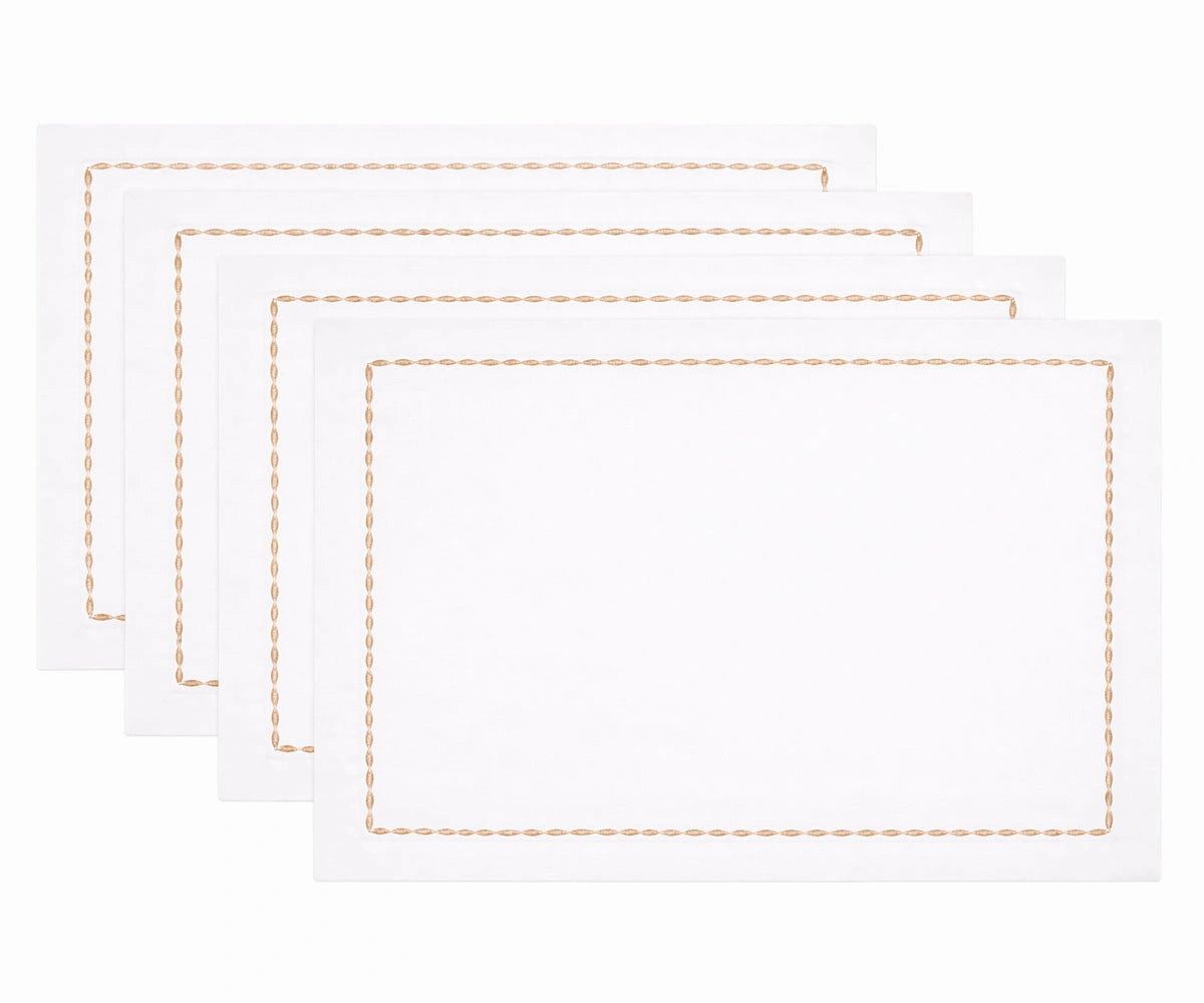 White cotton table napkins with embroidered borders White cotton table napkins with embroidered borders