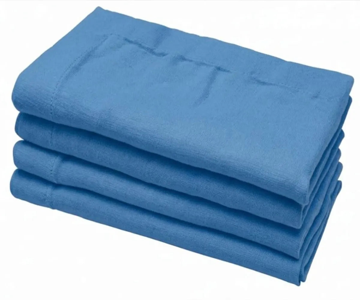 Soft cotton linen reusable napkins arranged for formal dining and wedding receptions Soft cotton linen reusable napkins arranged for formal dining and wedding receptions