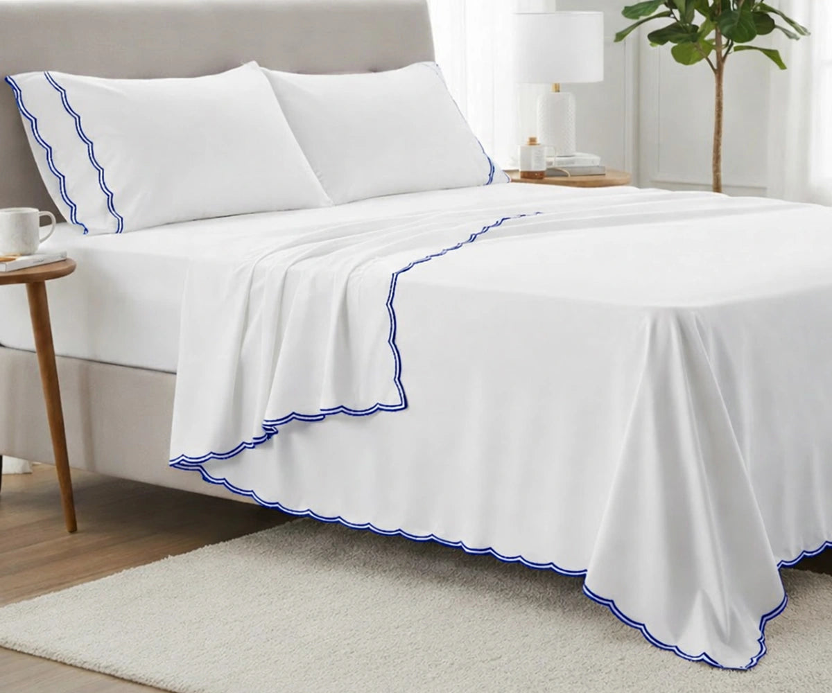 Royal blue scalloped edge bed sheet set in 100% cotton with flat sheet and fitted sheet Royal blue scalloped edge bed sheet set in 100% cotton with flat sheet and fitted sheet