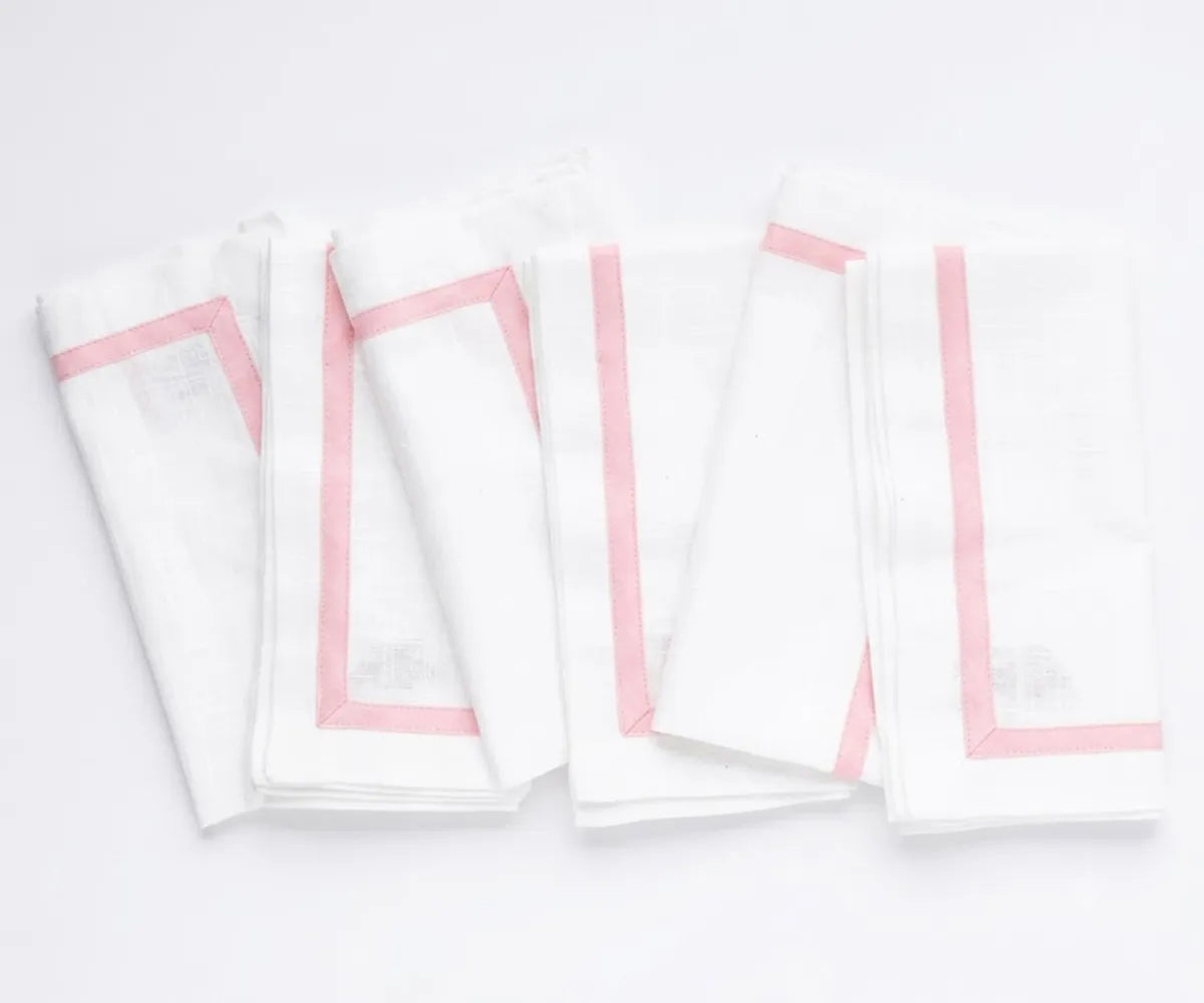 Reusable cotton dinner napkins featuring a classic border design for farmhouse, modern, and formal table settings. Reusable cotton dinner napkins featuring a classic border design for farmhouse, modern, and formal table settings.