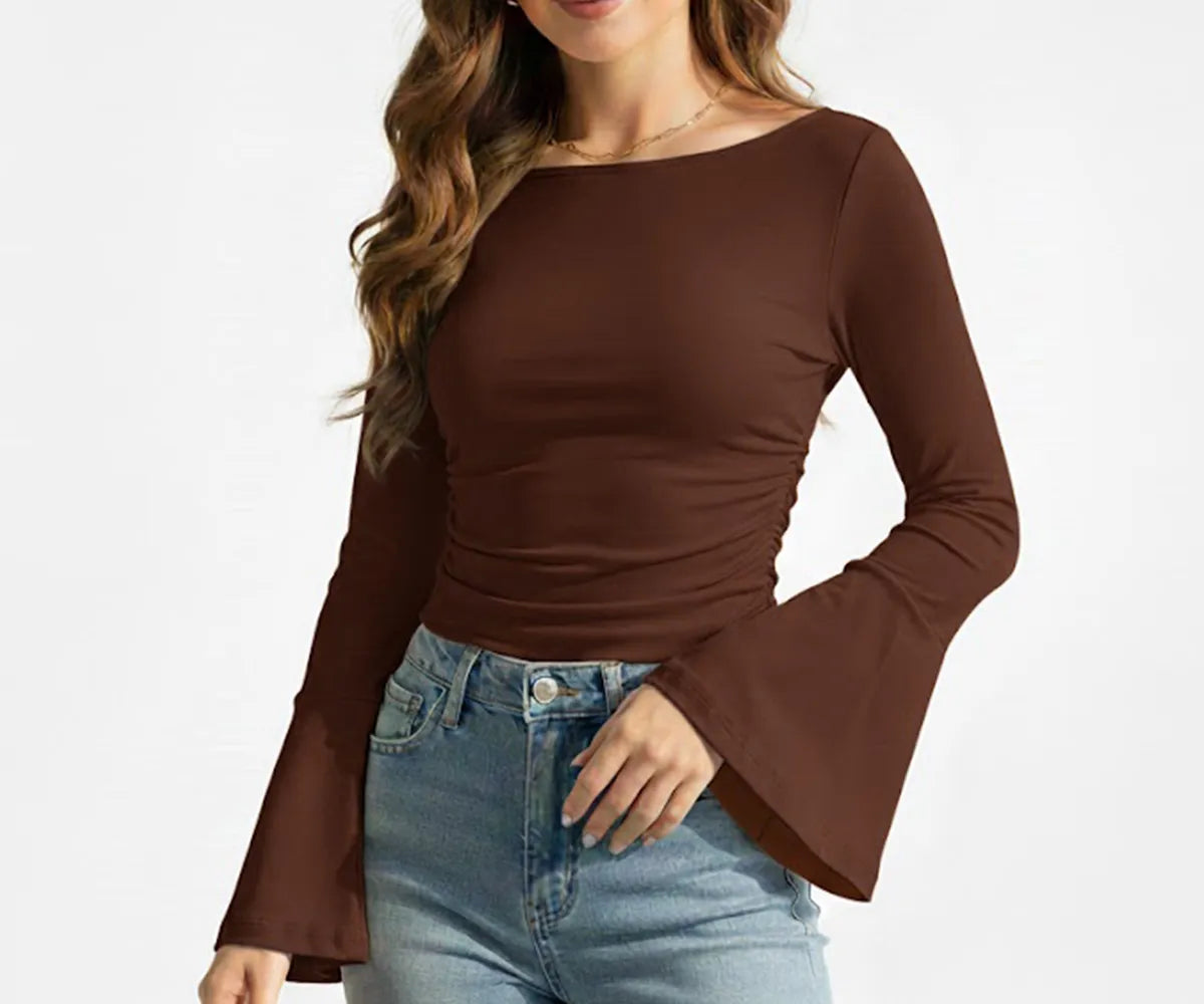 Brown long sleeve boatneck women’s t-shirt made from organic cotton, photographed to emphasize natural tones and relaxed comfortable fit. Brown long sleeve boatneck women’s t-shirt made from organic cotton, photographed to emphasize natural tones and relaxed comfortable fit.
