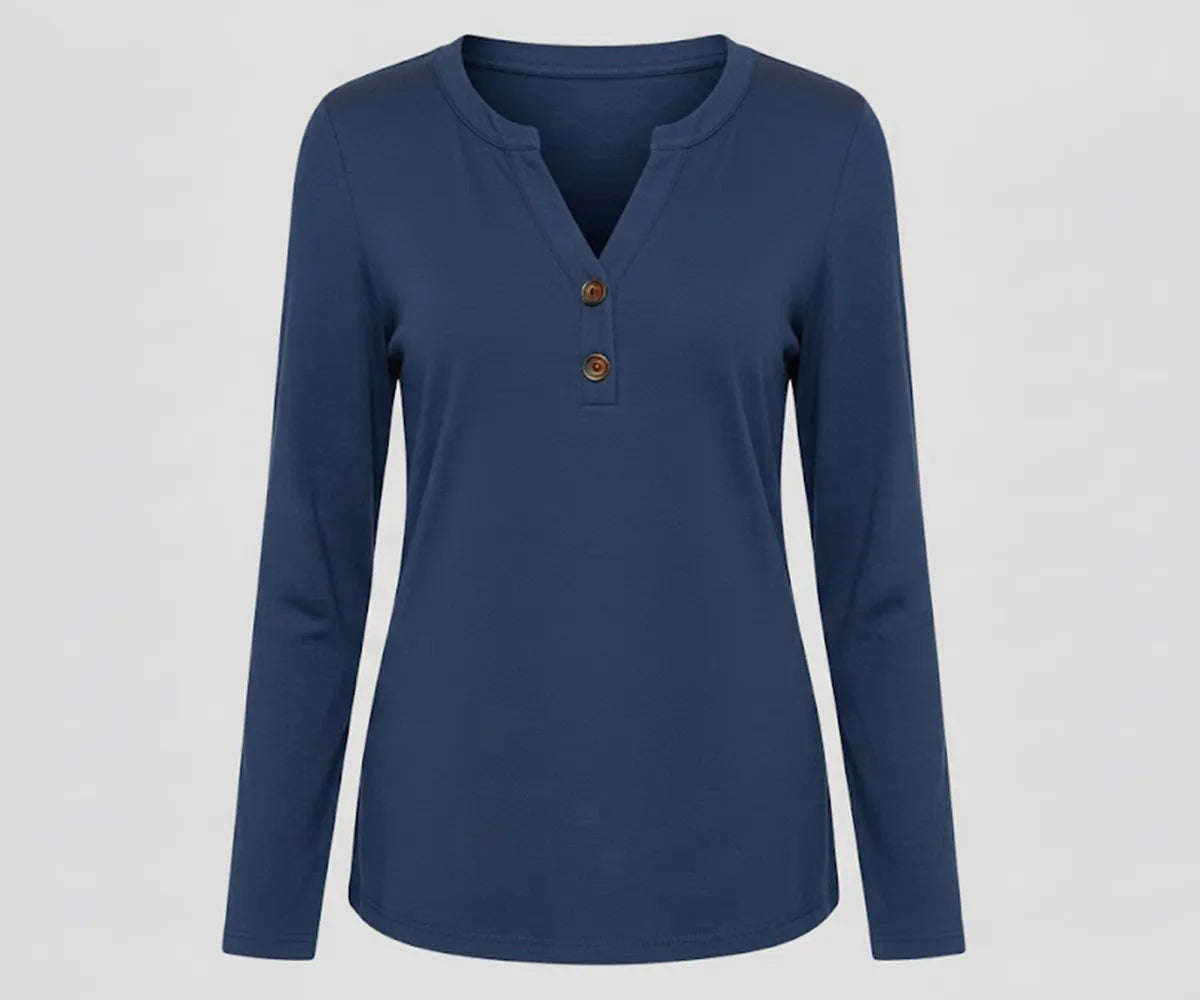 Women’s blue V-neck long sleeve organic cotton tee featuring a cool, versatile tone ideal for work, travel, and layering. Women’s blue V-neck long sleeve organic cotton tee featuring a cool, versatile tone ideal for work, travel, and layering.