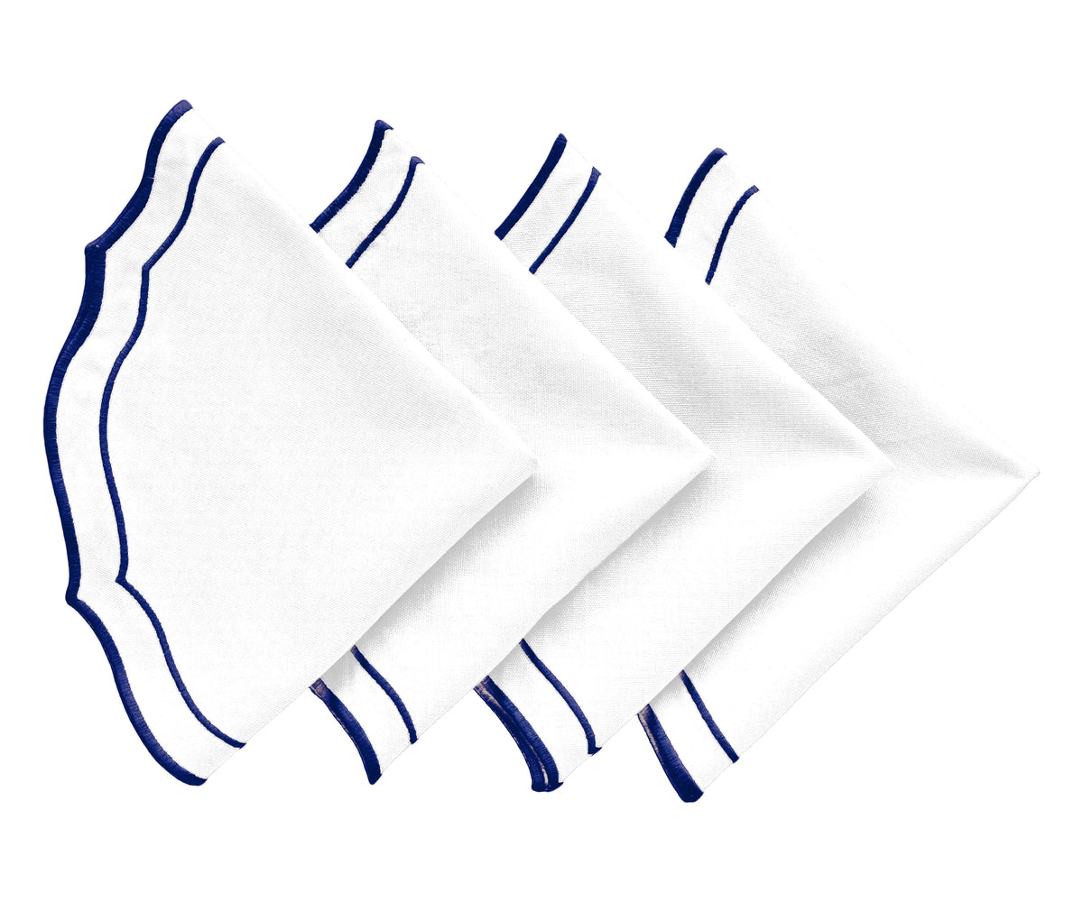 Elegant navy table placemats arranged for festive dinner setup Elegant navy table placemats arranged for festive dinner setup