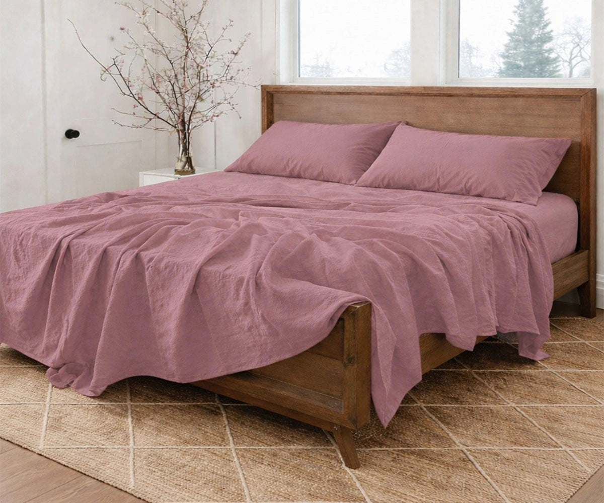 Luxury dusty mauve linen bed sheets set including fitted sheet, flat sheet and pillowcases, soft washed European linen bedding for modern bedroom Luxury dusty mauve linen bed sheets set including fitted sheet, flat sheet and pillowcases, soft washed European linen bedding for modern bedroom