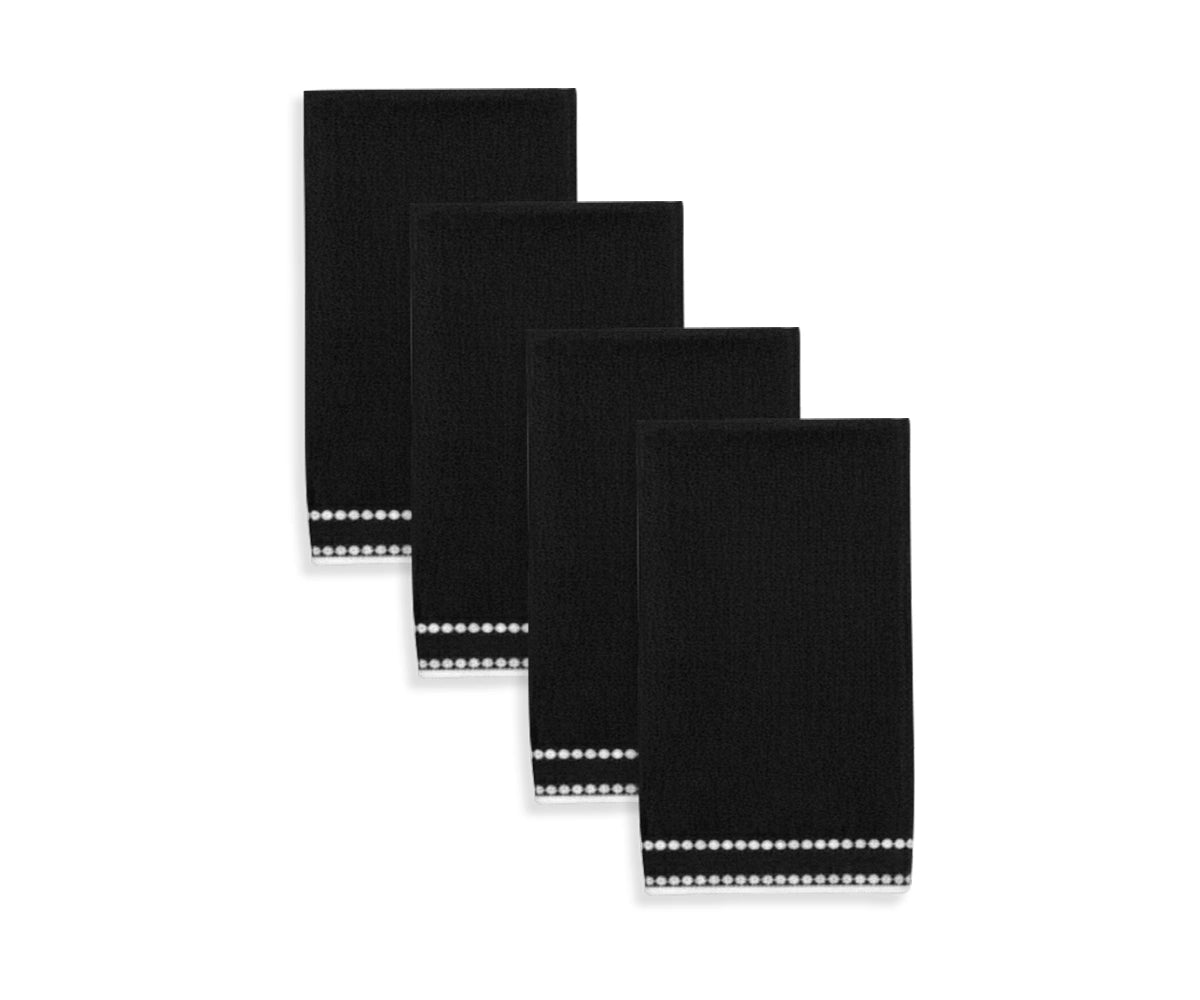 Black napkin with contrasting pearl dot embroidery, creating a bold and chic table statement. Black napkin with contrasting pearl dot embroidery, creating a bold and chic table statement.