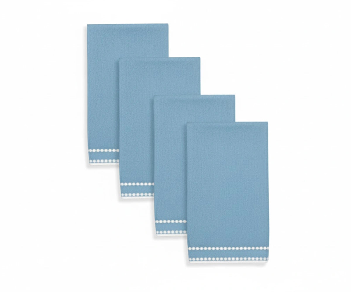 Light blue napkin with delicate pearl dot embroidery, offering a calm and stylish table touch. Light blue napkin with delicate pearl dot embroidery, offering a calm and stylish table touch.