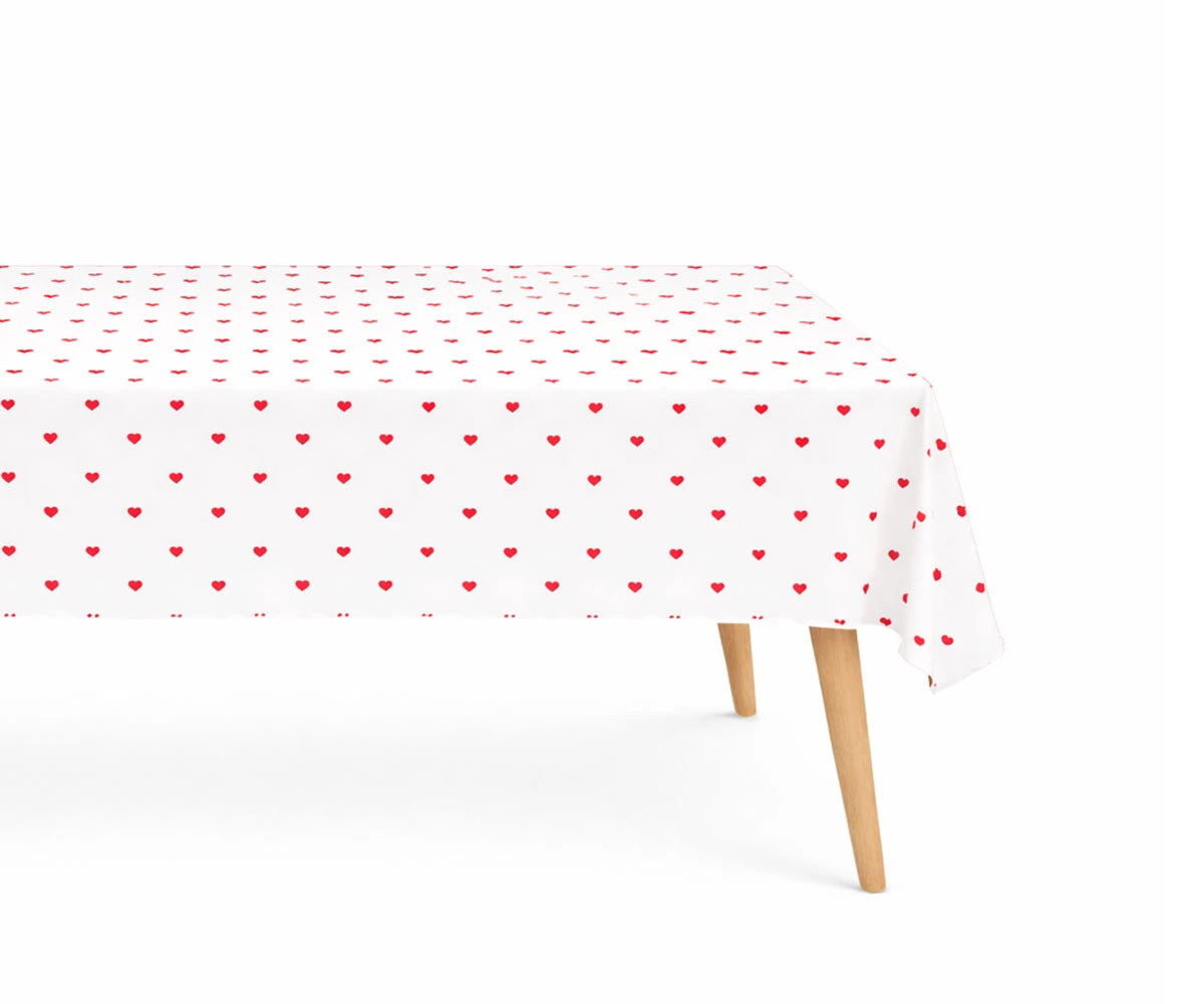 Valentine’s Day heart table cover with red heart print on white fabric Valentine’s Day heart table cover with red heart print on white fabric