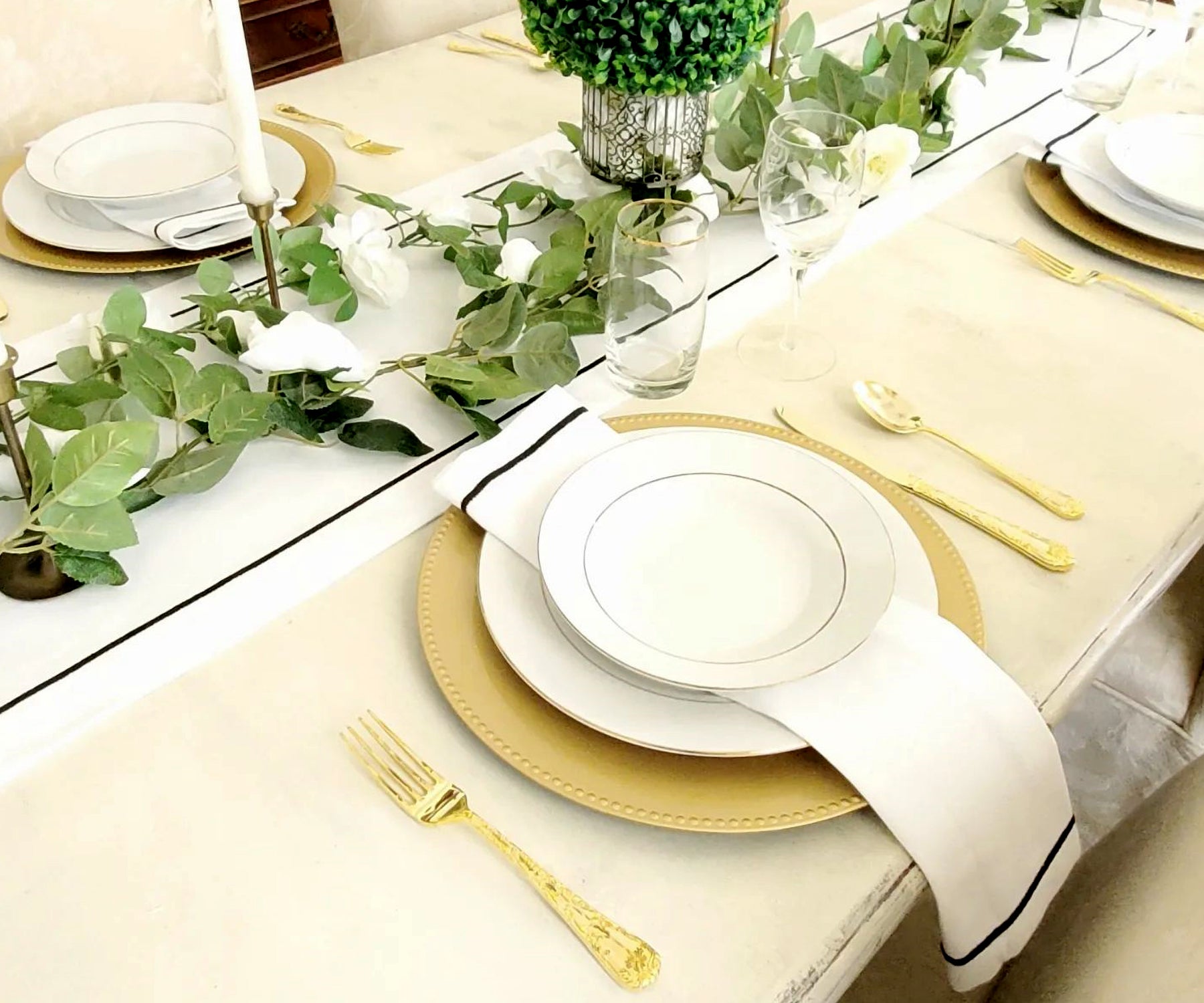 Delicate line embroidery adds charm to this cotton runner. Delicate line embroidery adds charm to this cotton runner.