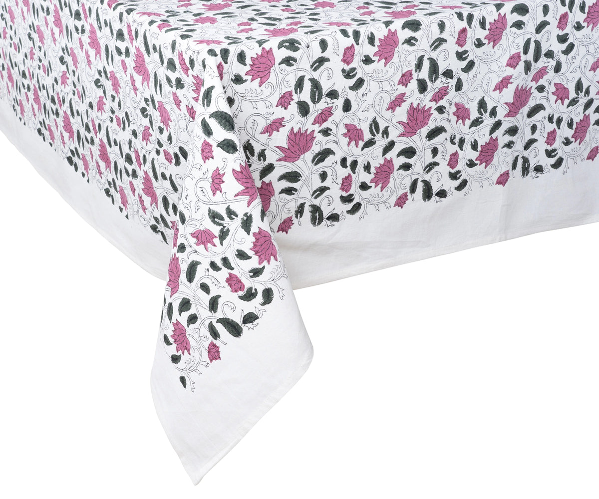 Floral patterned tablecloth with pink and black flowers on a white background Floral patterned tablecloth with pink and black flowers on a white background