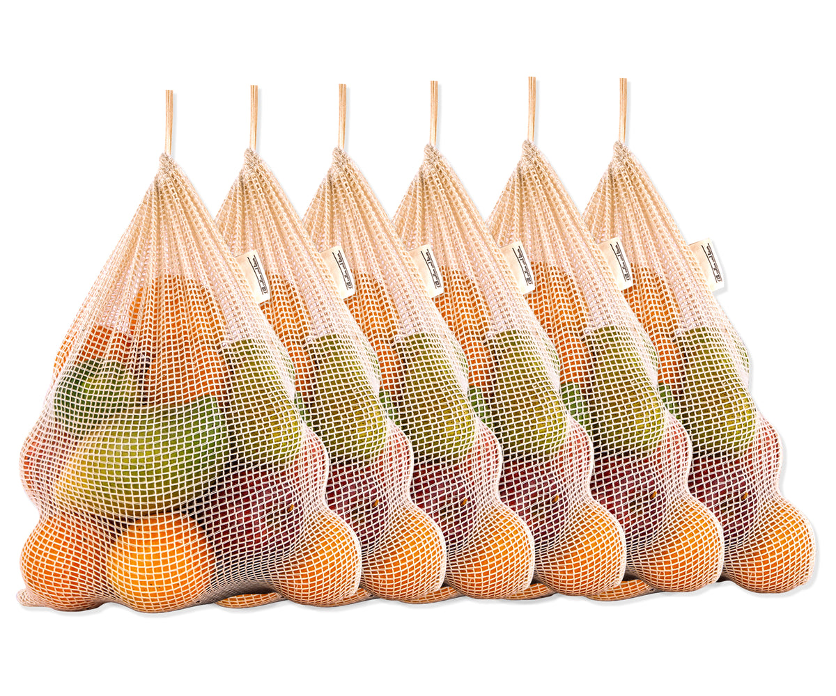 Grocery bags: Mesh BAgs: A collection of six filled reusable mesh produce bags arranged for display. Grocery bags: Mesh BAgs: A collection of six filled reusable mesh produce bags arranged for display.