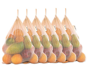 A collection of six filled reusable mesh produce bags arranged for display