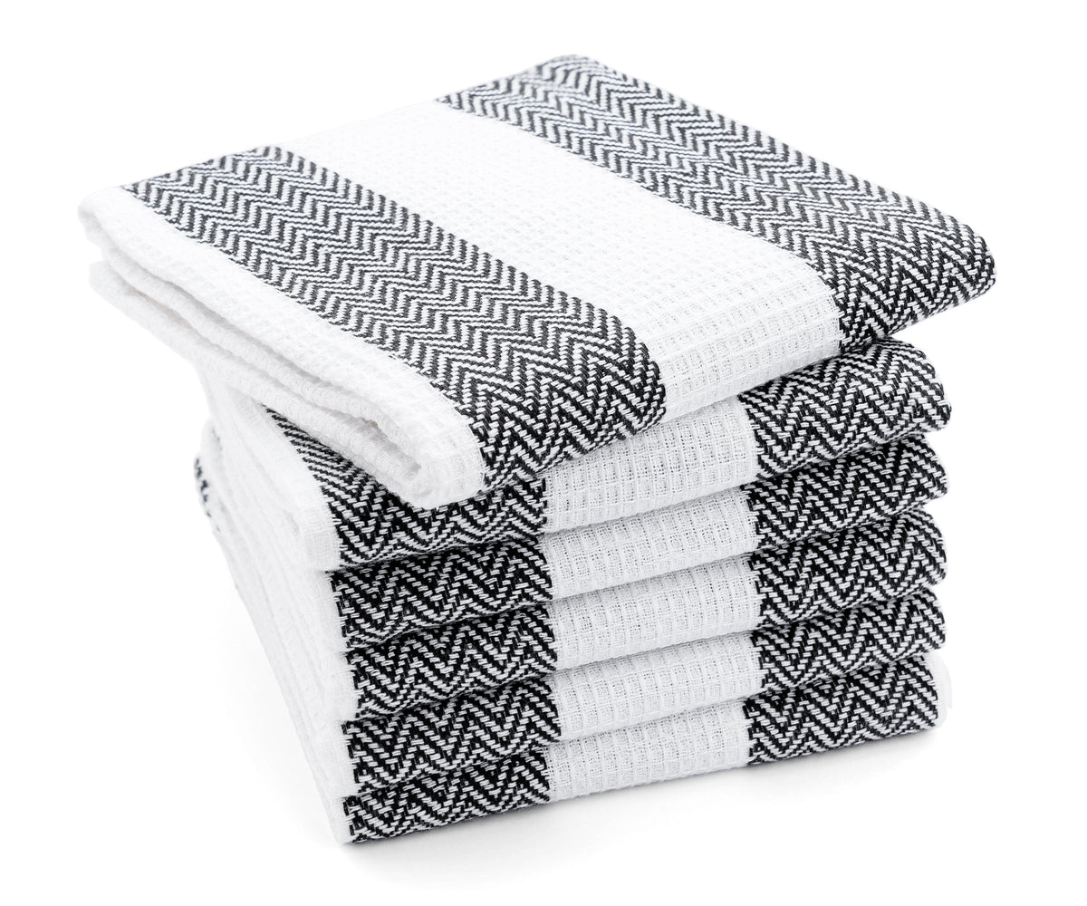 Striped towel, adding a touch of elegance to your kitchen space. Striped towel, adding a touch of elegance to your kitchen space.