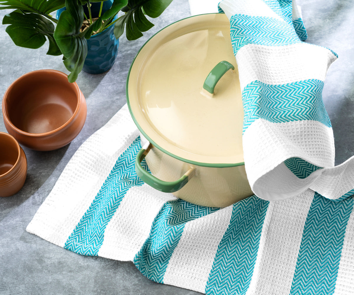 Hanging kitchen towel with hooks for easy and accessible storage. Hanging kitchen towel with hooks for easy and accessible storage.
