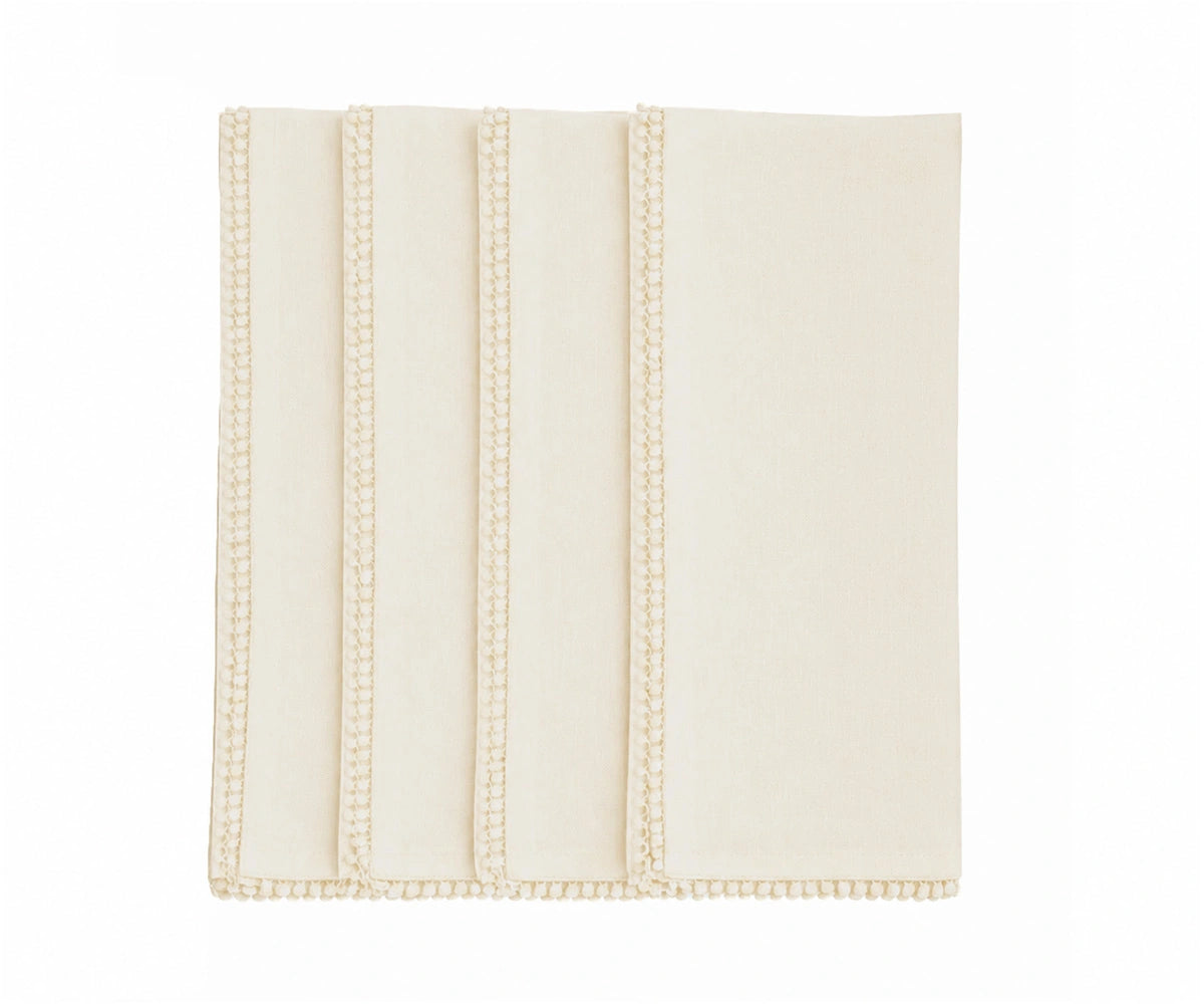 Ivory cloth napkins with decorative pom pom border, premium cotton dinner napkins for bridal showers, baby showers, wedding receptions, festive entertaining, and neutral farmhouse table décor. Ivory cloth napkins with decorative pom pom border, premium cotton dinner napkins for bridal showers, baby showers, wedding receptions, festive entertaining, and neutral farmhouse table décor.