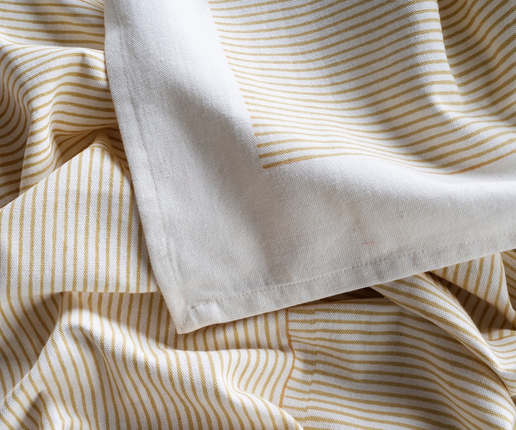 Durable beige tablecloth for rectangular tables styled in a modern kitchen Durable beige tablecloth for rectangular tables styled in a modern kitchen