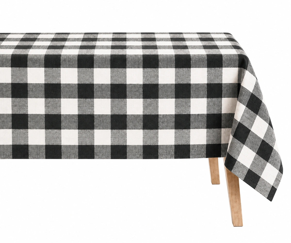 Black gingham linen tablecloth for rectangular dining table with classic checkered pattern Black gingham linen tablecloth for rectangular dining table with classic checkered pattern