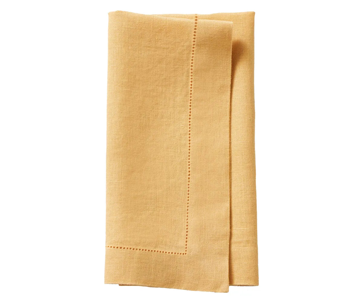 Linen napkins used in an elegant brunch setting with juice glasses and fresh fruit. Linen napkins used in an elegant brunch setting with juice glasses and fresh fruit.