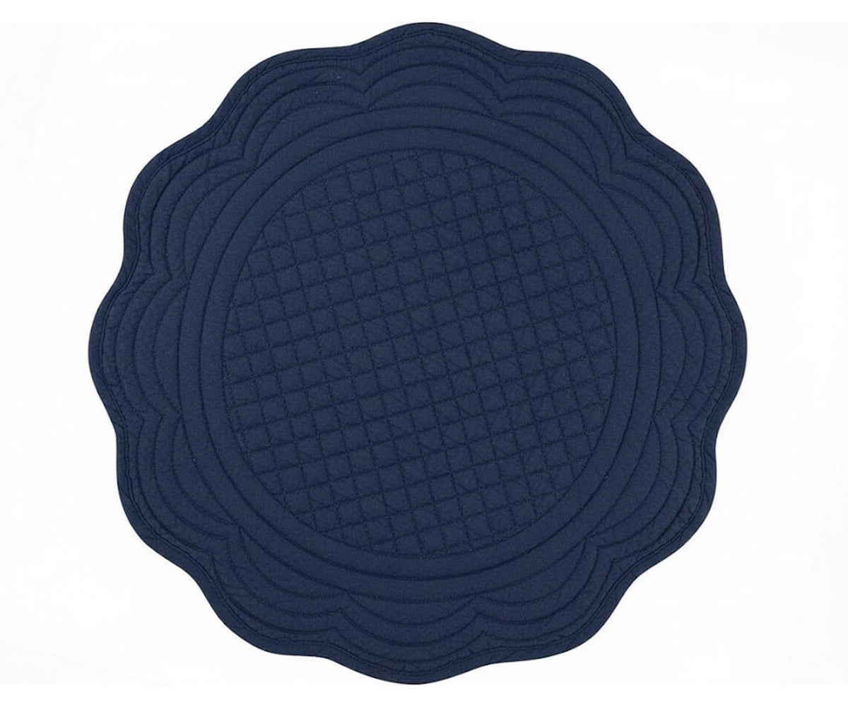 Navy blue quilted cotton round placemat with scalloped edge for classic and formal table décor Navy blue quilted cotton round placemat with scalloped edge for classic and formal table décor