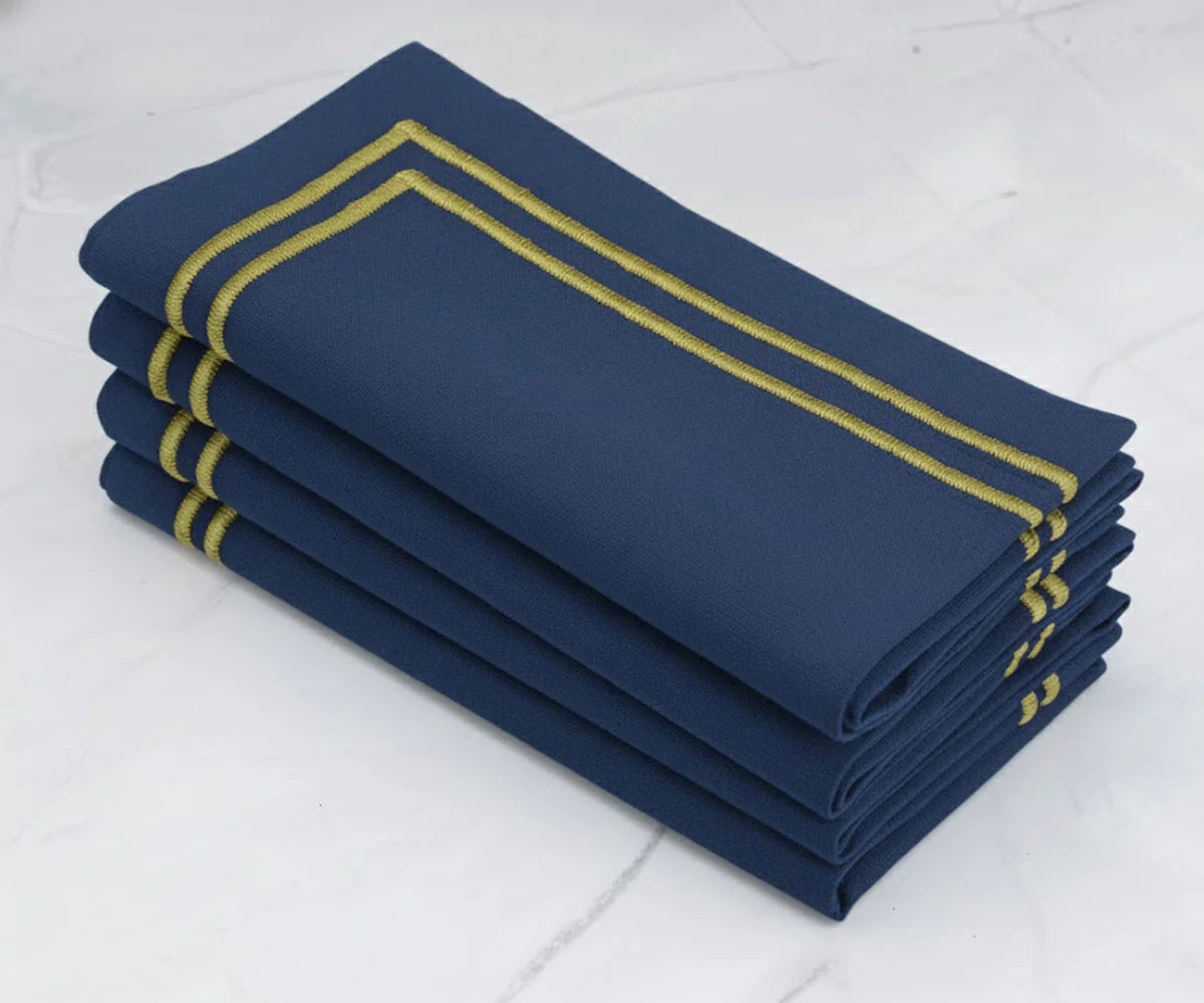 Dark navy cotton napkins with gold border, luxury table linens Dark navy cotton napkins with gold border, luxury table linens