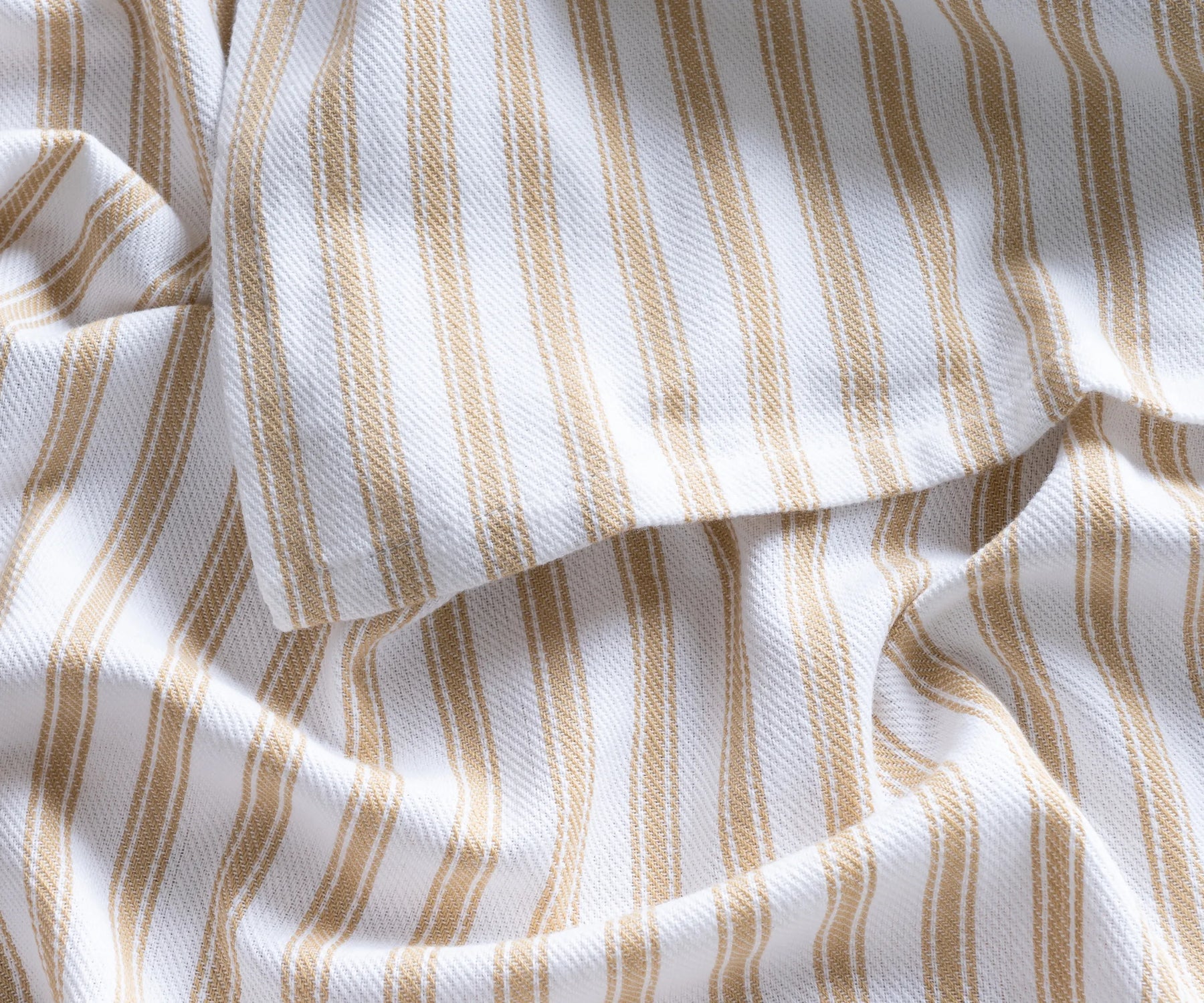 Cozy dining setup with beige ticking stripe round tablecloth for everyday use Cozy dining setup with beige ticking stripe round tablecloth for everyday use