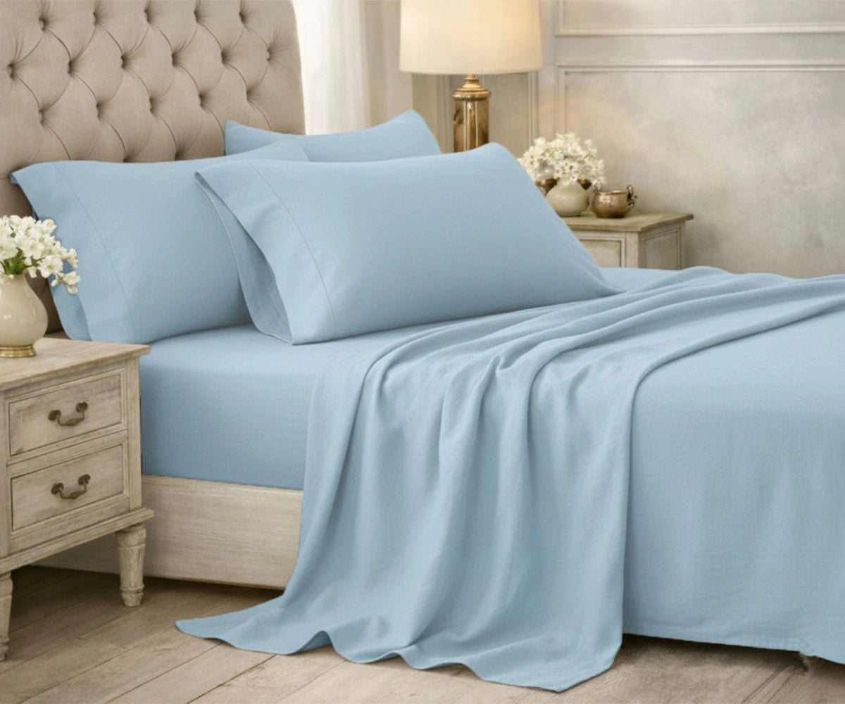 Light blue cotton bedsheet set with relaxed, airy look Light blue cotton bedsheet set with relaxed, airy look