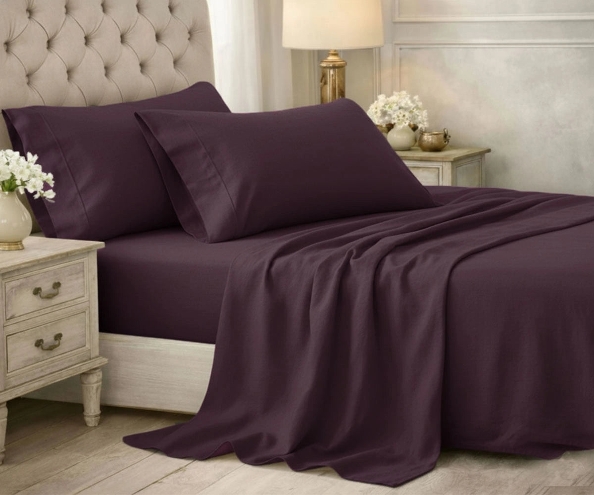 Purple colored cotton bedsheet set with cozy appearance Purple colored cotton bedsheet set with cozy appearance