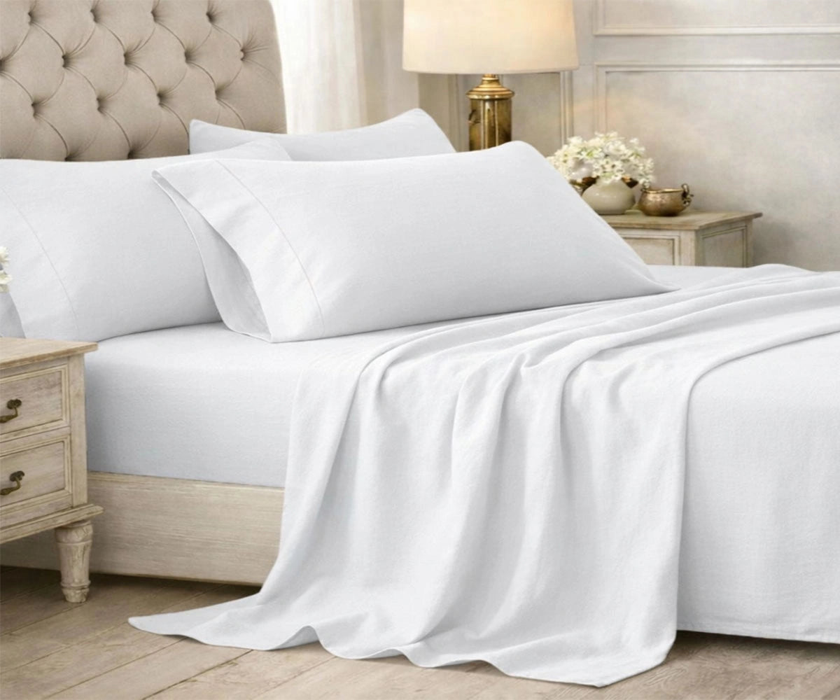 White cotton bedsheet set with clean, classic styling White cotton bedsheet set with clean, classic styling