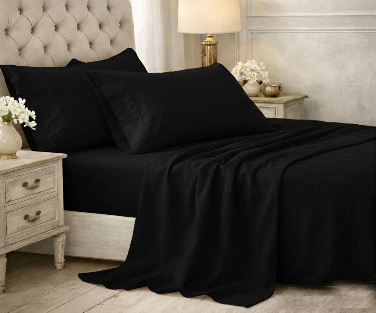 Black Cotton bedsheet set with smooth drape on bed Black Cotton bedsheet set with smooth drape on bed