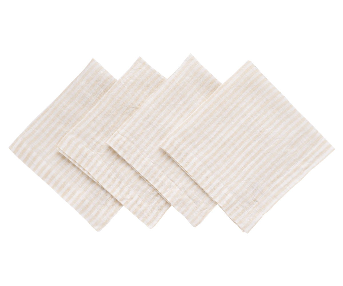 Subtle beige napkins, versatile enough to complement any table decor or occasion. Subtle beige napkins, versatile enough to complement any table decor or occasion.