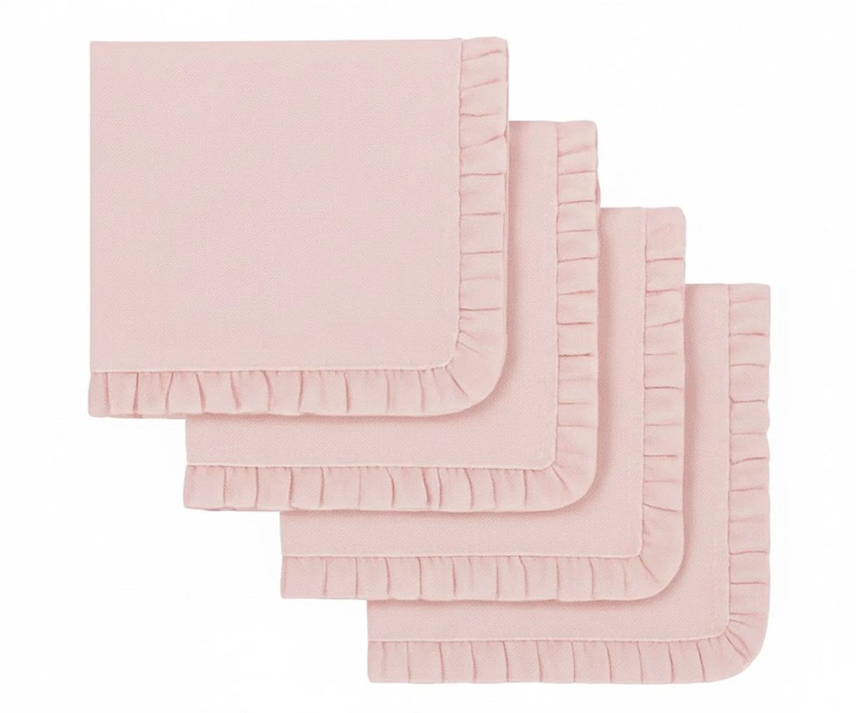 Blush pink ruffled cloth napkins stacked together Blush pink ruffled cloth napkins stacked together