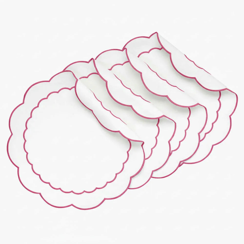 Pink round scalloped cotton placemat with delicate peony embroidery for a soft, elegant table setting Pink round scalloped cotton placemat with delicate peony embroidery for a soft, elegant table setting