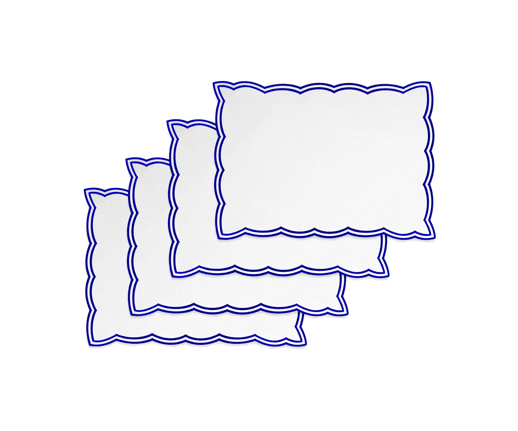 Royal blue embroidered placemats paired with matching napkins for a cohesive wedding tablescape Royal blue embroidered placemats paired with matching napkins for a cohesive wedding tablescape