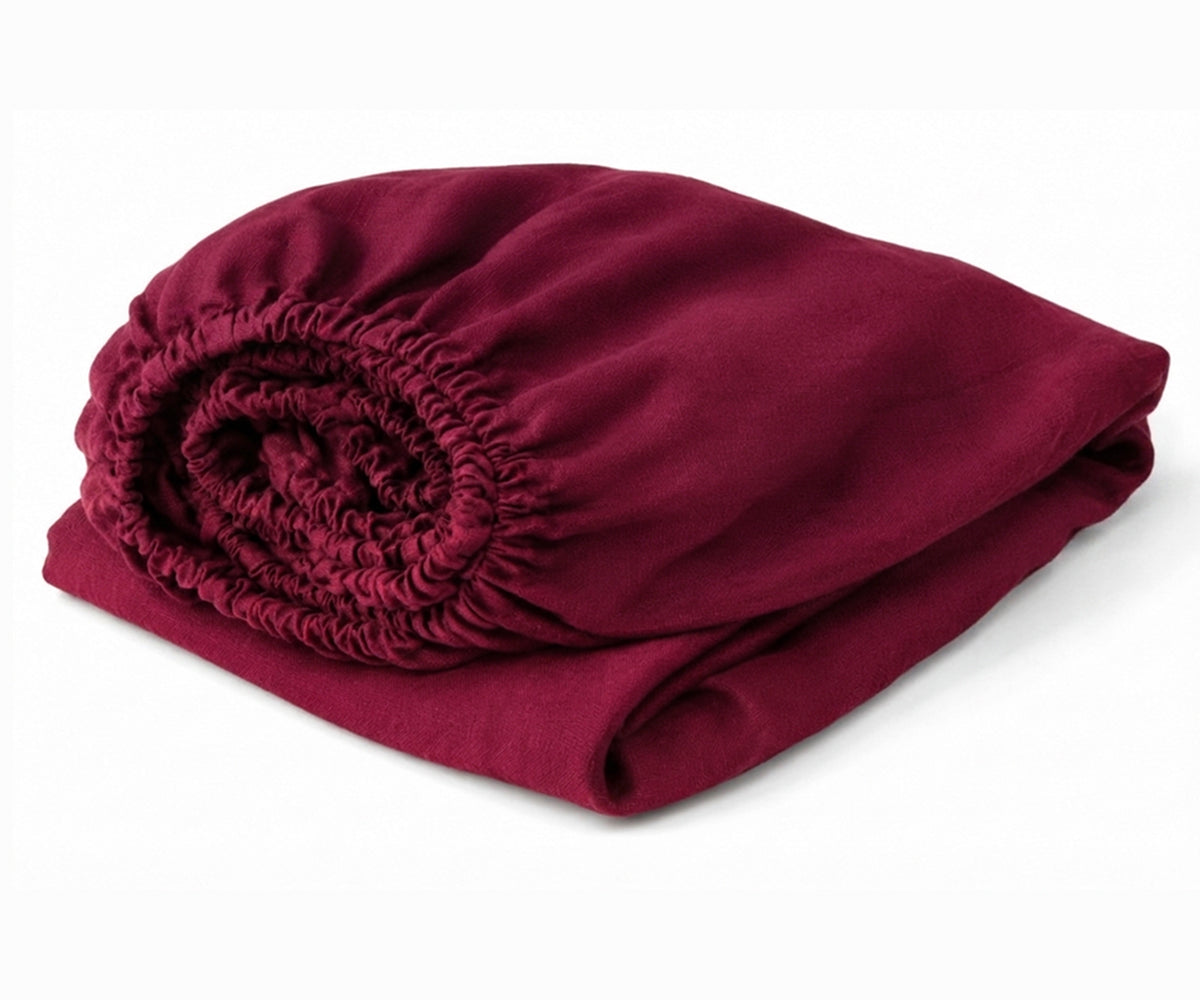 Burgundy European linen fitted sheet crafted from premium flax linen, deep pocket fitted bedding with soft, breathable comfort for every season. Burgundy European linen fitted sheet crafted from premium flax linen, deep pocket fitted bedding with soft, breathable comfort for every season.