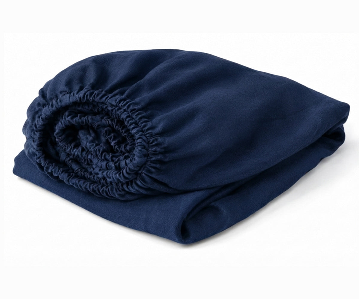 Navy Blue luxury linen fitted sheet made from 100% European linen with deep pockets, breathable cooling bedding for modern bedrooms. Navy Blue luxury linen fitted sheet made from 100% European linen with deep pockets, breathable cooling bedding for modern bedrooms.