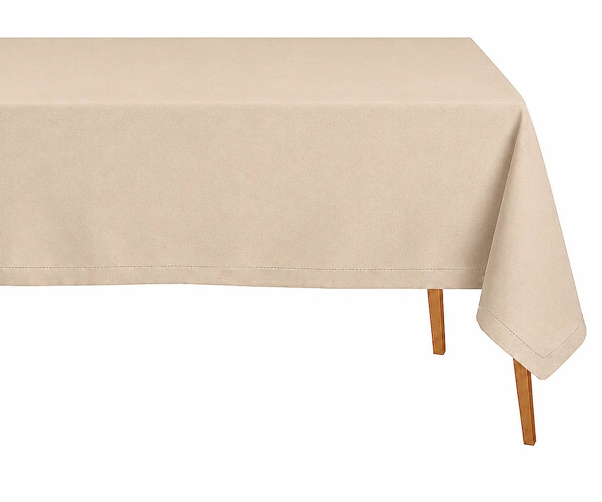 Beige linen dining tablecloth with soft hemstitched edges displayed in a neutral farmhouse dining setting with timeless rustic charm. Beige linen dining tablecloth with soft hemstitched edges displayed in a neutral farmhouse dining setting with timeless rustic charm.