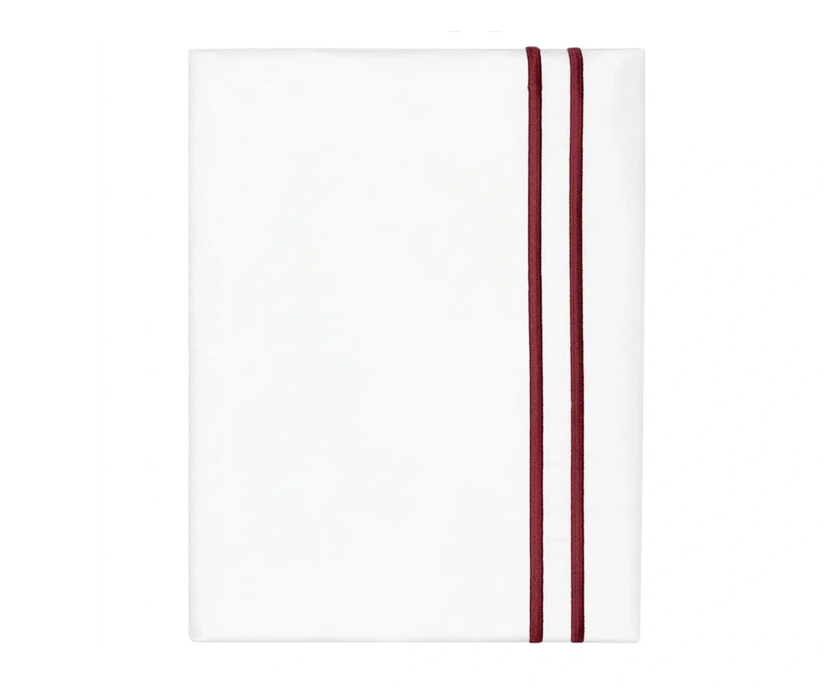 White cotton flat sheet with red double line embroidery border White cotton flat sheet with red double line embroidery border