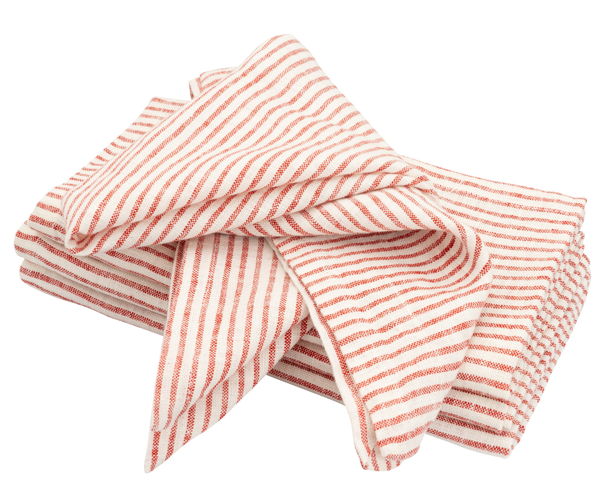 Set of 12 red striped napkins displayed in a farmhouse-style kitchen setting Set of 12 red striped napkins displayed in a farmhouse-style kitchen setting