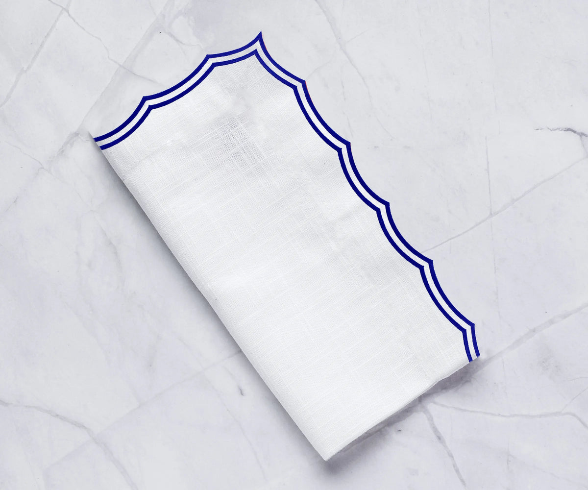 Elegant 100% cotton dinner napkins in royal blue for wedding table setting Elegant 100% cotton dinner napkins in royal blue for wedding table setting