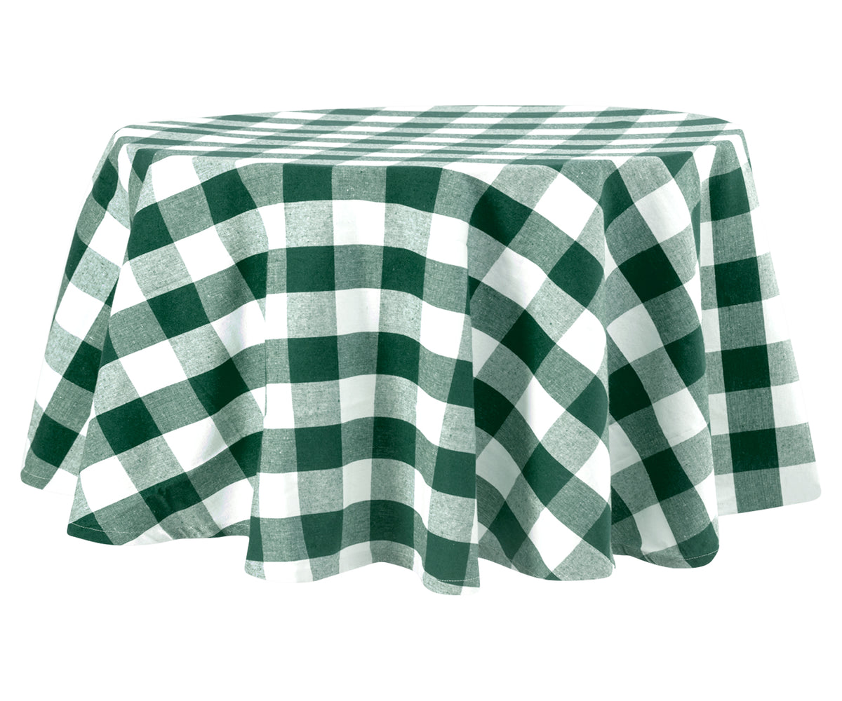 Gingham-style green and white plaid tablecloth on round table Gingham-style green and white plaid tablecloth on round table