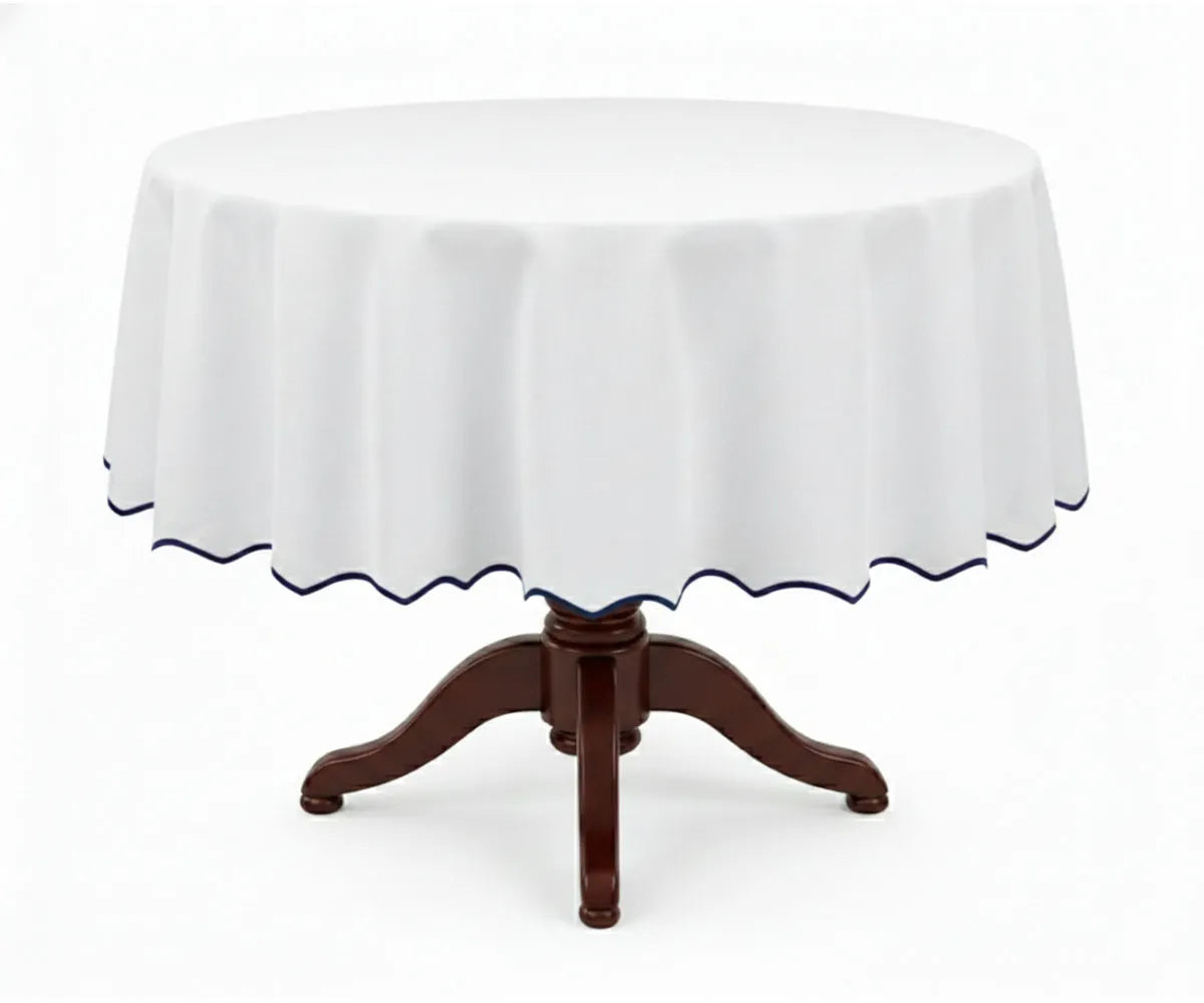 White round cotton tablecloth with a deep navy blue scalloped edge, made from premium 100% cotton for a smooth and polished drape. This white tablecloth with navy trim adds sophistication to round dining tables, suitable for formal dinners, holiday settings, weddings, and special occasions. White round cotton tablecloth with a deep navy blue scalloped edge, made from premium 100% cotton for a smooth and polished drape. This white tablecloth with navy trim adds sophistication to round dining tables, suitable for formal dinners, holiday settings, weddings, and special occasions.