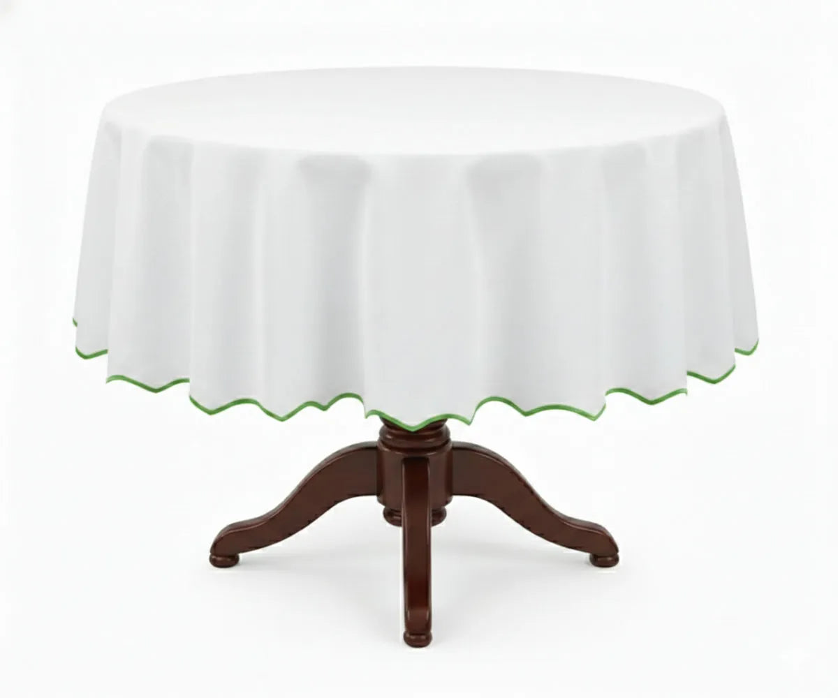 White round cotton tablecloth featuring a soft green scalloped edge, crafted from 100% cotton for a smooth, elegant drape. This white tablecloth with green trim suits round dining tables, blending farmhouse and modern décor styles, ideal for everyday dining, brunches, garden parties, weddings, and special occasions. White round cotton tablecloth featuring a soft green scalloped edge, crafted from 100% cotton for a smooth, elegant drape. This white tablecloth with green trim suits round dining tables, blending farmhouse and modern décor styles, ideal for everyday dining, brunches, garden parties, weddings, and special occasions.